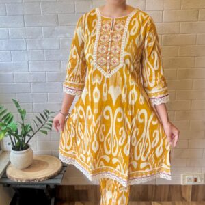 Sakhi Trendzs Vibrant Printed Cotton Suit Set - Mustard Color Collection